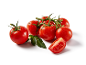 Fresh red cherry tomatoes on the vine with one sliced, on a white background.