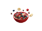 Red bowl of cereal, milk, raspberries, blueberries, and banana.