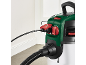 Green and white wet and dry vacuum cleaner with power cable and hose.