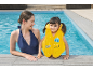 Mother and child in pool, child wearing yellow swim vest.