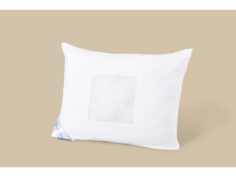 White pillow with a breathable mesh section and a blue label.