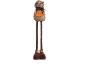 Hedgehog plush toy with long legs, wearing a scarf and holding an autumn leaf.