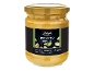 Jar of pistachio spread with a black and green label, featuring pistachios and text.