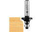 Wood router bit with a bearing, showing a rounded edge on a wooden board.