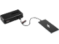 Black power bank charging a smartphone with a white lightning bolt on the screen.