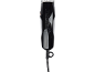 Black hair clipper with metallic blades and a cable.