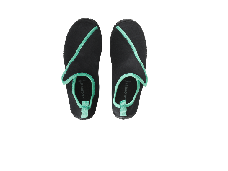 A pair of black water shoes with mint green detailing.