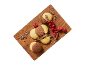 Butter and chocolate cookies with redcurrants and raspberries on a wooden board.