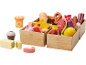 Wooden toys: food crates with fruits, vegetables, bread, cheese, and meat.