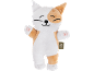 White and orange cat plush toy with a smiling face and paws with pink pads.