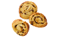 Three golden, rolled raisin swirls on a black background.