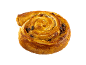 A golden, rolled raisin swirl on a black background.