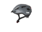 Grey bicycle helmet with a visor and a red rear light.