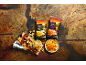 Salt and olive oil crisps and spicy crisps, with sausages and peppers.