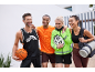 Four smiling friends in sportswear, with a basketball, bike helmet, and yoga mat.
