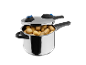 Metal pressure cooker with potatoes inside
