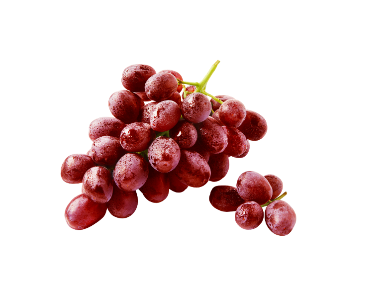 Fresh red grapes with water droplets on a black background.