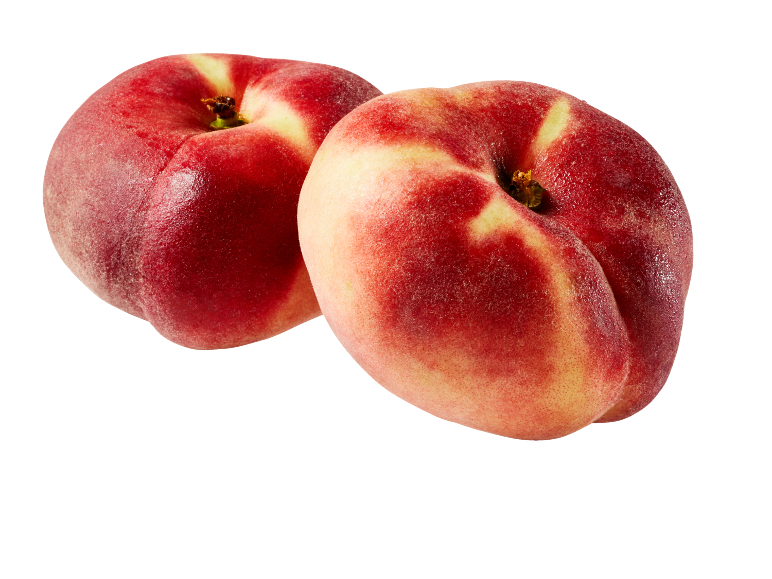 Two ripe flat peaches with red and yellow skin on a black background.
