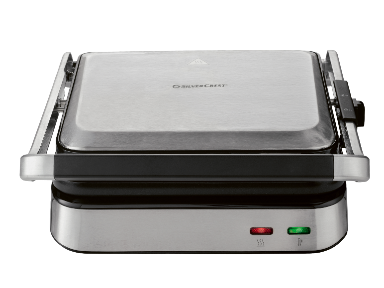 Closed stainless steel contact grill with red and green indicator lights.