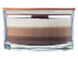 Three-layered candle in a glass jar with a wooden lid, in shades of brown and white.