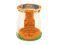 Creamy yogurt with Seville orange sauce in a glass jar.