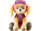 Plush toy of a brown dog with pink and purple uniform, sitting.