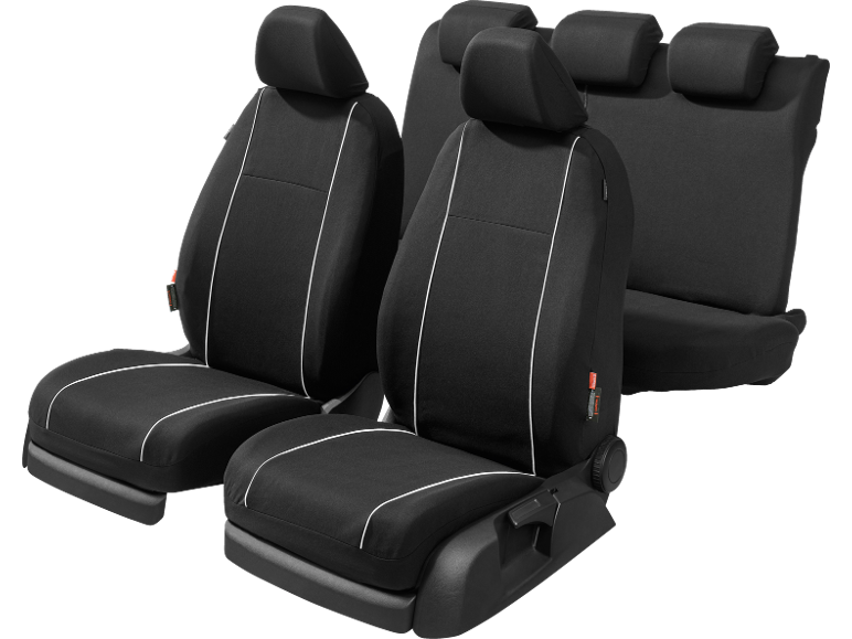 Set of black car seat covers with white stripes.