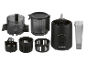 Disassembled electric juicer with motor base, containers, and black plastic accessories.