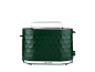 Green toaster with honeycomb texture and silver accents on a black background.