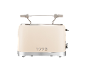 Cream retro-style toaster with chrome details and '1973' text.