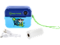 Blue children's camera with Paw Patrol design, USB cable, and paper roll.