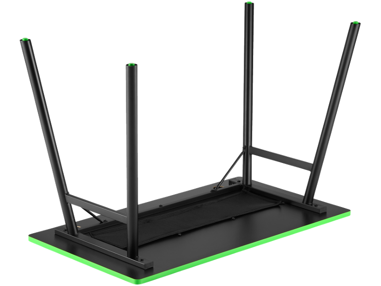 Black gaming desk with green edges and metal legs, viewed from underneath.