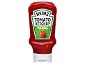 Red ketchup bottle with a label for tomato ketchup pickle flavour.