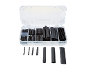A clear plastic organizer box filled with various sizes of black heat shrink tubing, with more tubes laid out below.