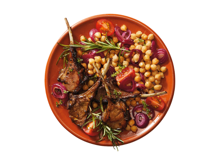 Grilled lamb chops with chickpeas, red onion, cherry tomatoes, and rosemary.