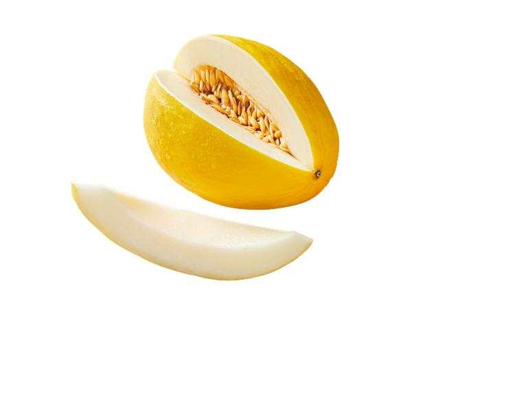 Halved yellow melon and a slice on a black background.
