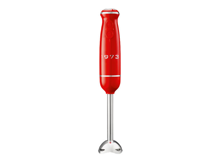Red immersion blender with silver details and '1973' text.