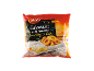 Breaded squid rings in a package, with lemon and sauce.