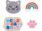 Embroidered patches: a grey cat, rainbow, 'Good Vibes Only' text, and a pink paw print.