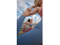 Two women in sportswear doing yoga outdoors.