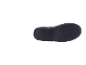 Shoe sole with a textured surface of small nubs on a black background.
