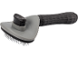 Gray pet brush with a black handle and metal bristles.