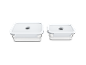Two rectangular vacuum food storage containers with white lids and clear bases.
