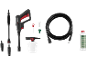 Pressure washer set with gun, hose, nozzles, and cleaning solution.
