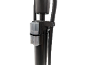 Close-up of a black bicycle pump with a transparent valve attachment showing 'OPEN' and an arrow.