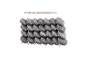 Round felt pads with nails and a drill bit.