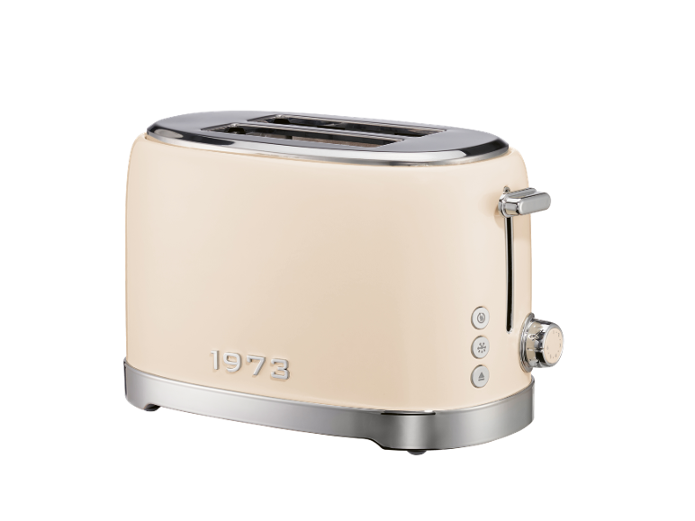 Cream retro toaster with chrome accents and '1973' embossed text