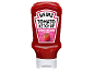 Tomato ketchup bottle with smoky bacon flavor, featuring a tomato on the front.