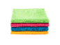 Stack of colorful microfiber cloths in green, pink, blue, and orange.