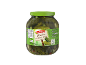 Large jar of pickled gherkins and onions with a green lid.